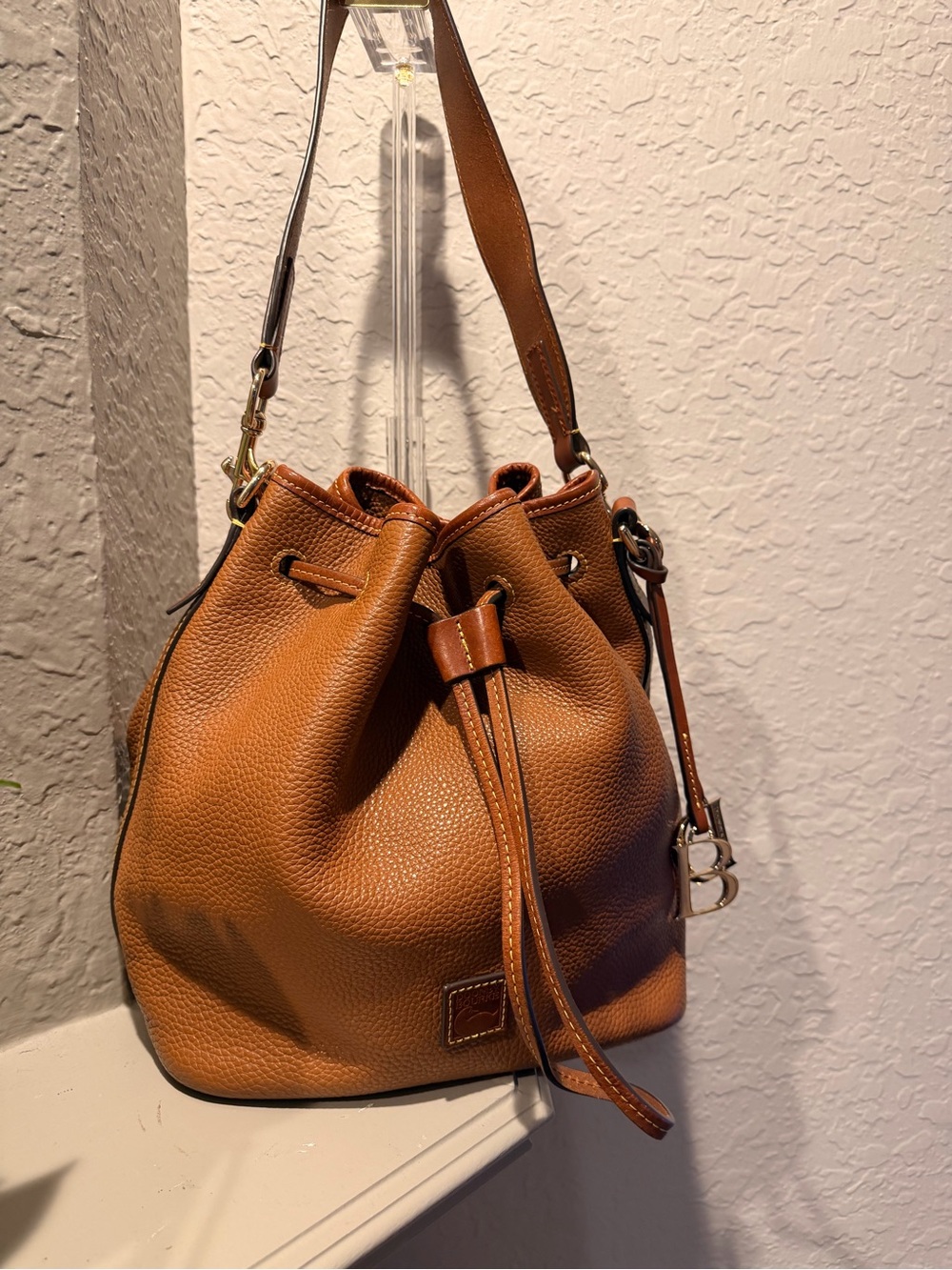 Dooney & Bourke Tan Pebbled Leather Drawstring Shoulder Bag